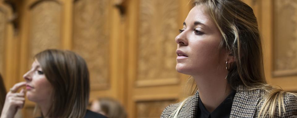 Une session des femmes se déroule vendredi et samedi au Palais fédéral (image: Nancy Duc, à droite). [Keystone - Peter Klaunzer]