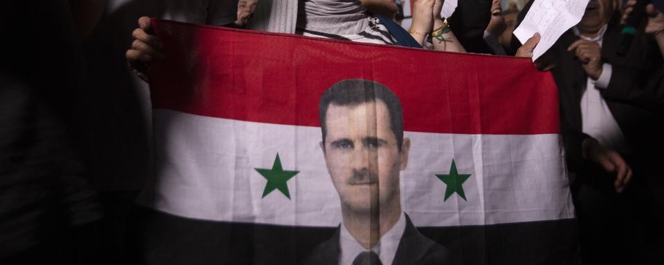 Des manifestants pro-Assad en octobre 2019. [EPA/Keystone - Andre Pain]