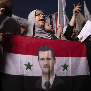 Des manifestants pro-Assad en octobre 2019. [EPA/Keystone - Andre Pain]