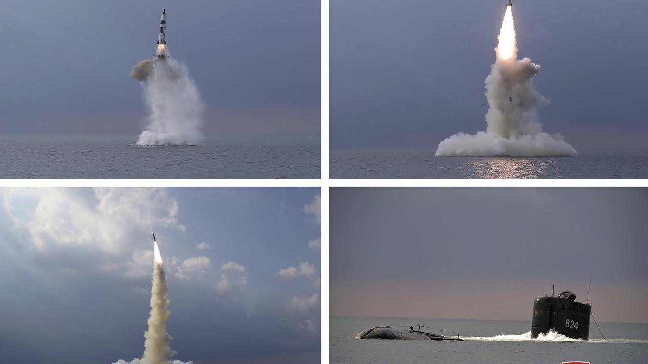 Cette combinaison de photos montrant un missile balistique lancé d'un sous-marin provient du gouvernement nord-coréen. [Korean Central News Agency]