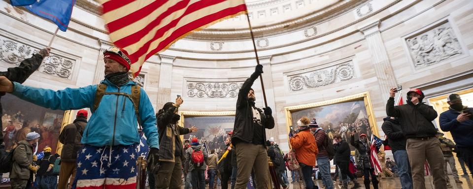 Des défaillances de communication et de gouvernance ont permis l'assaut du Capitole. [EPA - JIM LO SCALZO]