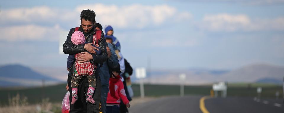 Des milliers d'Afghans se sont lancés sur la route de l’Europe via la Turquie (ici, à Erzurum en 2017). [EPA/Keystone - Erdem Sahin]