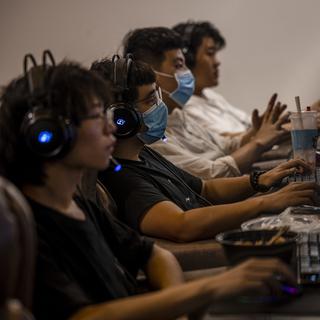 Les autorités chinoises continuent leur offensive contre le secteur des jeux vidéos. [Alex Plavevski - Keystone]