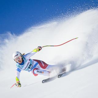 La Suissesse Joana Haehlen en action lors de la course de Super-G féminin de la Coupe du monde de ski alpin FIS, à Saint-Moritz, en Suisse, dimanche 12 décembre 2021. [Jean-Christophe Bott - KEYSTONE]