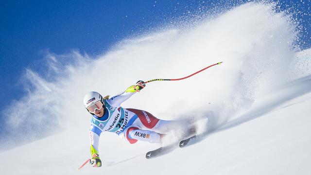 La Suissesse Joana Haehlen en action lors de la course de Super-G féminin de la Coupe du monde de ski alpin FIS, à Saint-Moritz, en Suisse, dimanche 12 décembre 2021. [Jean-Christophe Bott - KEYSTONE]