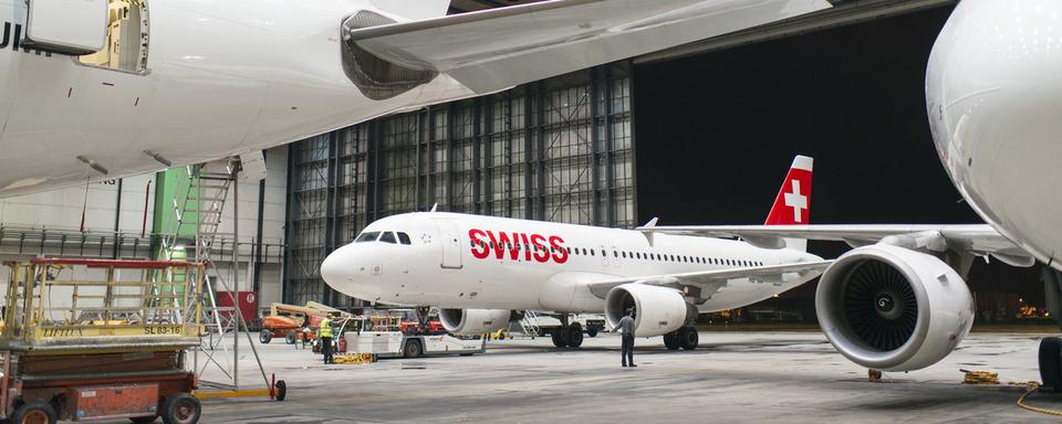 Les avions de Swiss ont été cloués au sol plusieurs mois en raison de la crise du Covid-19. [Keystone - Christian Beutler]