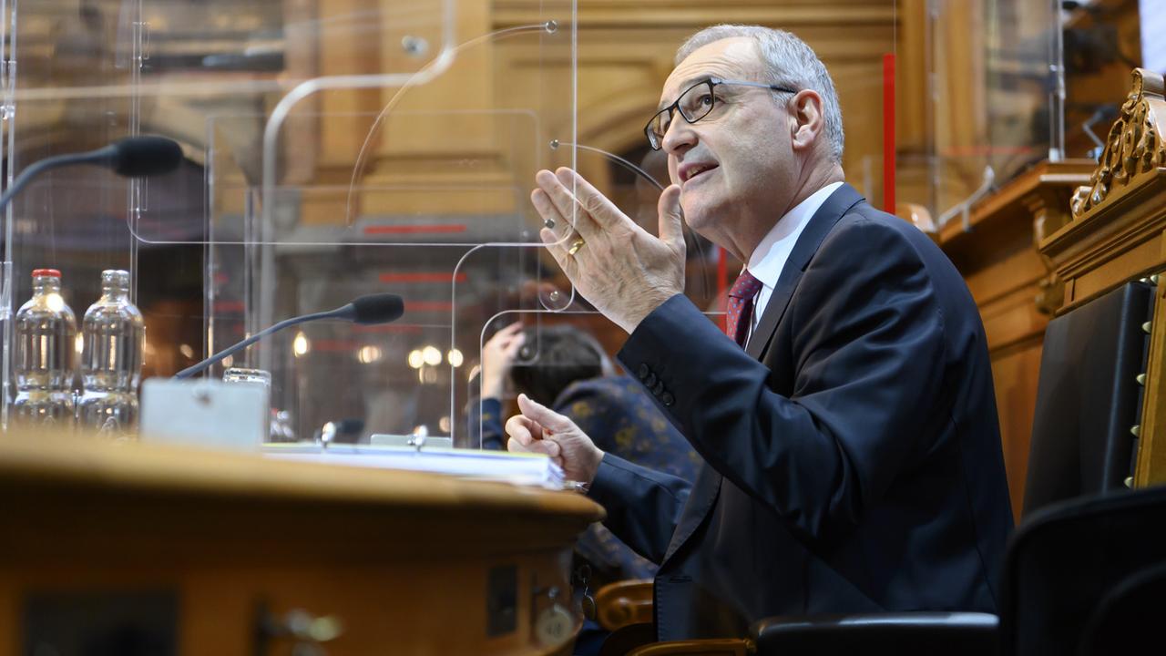 Le président de la Confédération Guy Parmelin s'exprime lors de la session d'hiver des Chambres fédérales, le 15 décembre 2021. [Keystone - Anthony Anex]