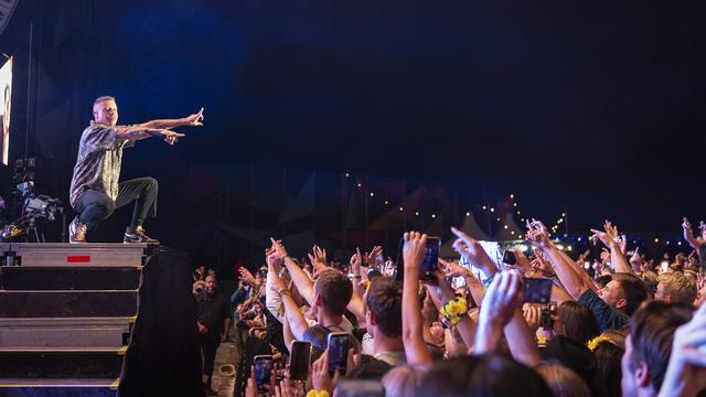 Le Département d'Alain Berset envisage de réautoriser les événements rassemblant 1000 personnes à partir du mois de juillet 2021 (photo: Zürich Openair). [Keystone - Melanie Duchene]