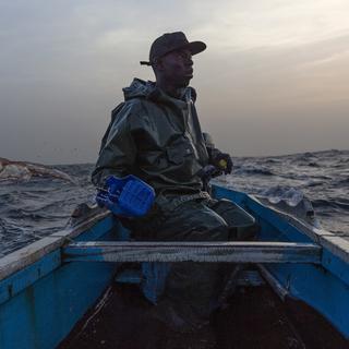 Un pêcheur sénégalais. [Keystone/EPA - Nic Bothma]