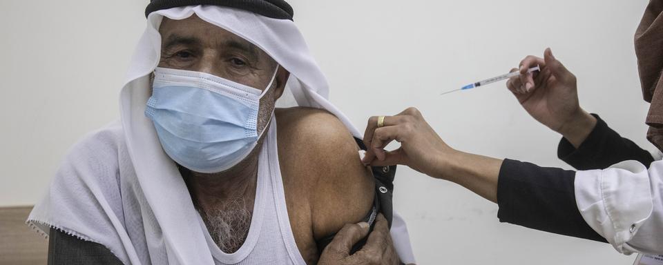 Les vaccins rejetés par les Palestiniens sont "totalement valides", affirme Israël [keystone - Tsafrir Abayov]