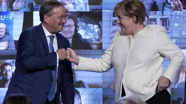 Angela Merkel s'engage aux côtés d'Armin Laschet. [Keystone - AP Photo/Matthias Schrader]