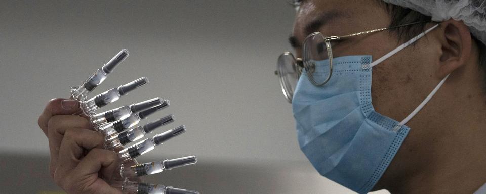 Quid de la distribution des vaccins chinois dans le monde ? [Keystone/AP Photo - Ng Han Guan]