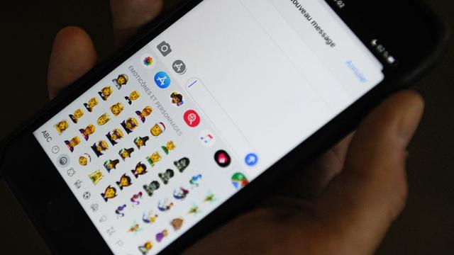 L'utilisation des émojis dans la communication numérique interroge la recherche universitaire. [AFP - TENGKU Bahar]