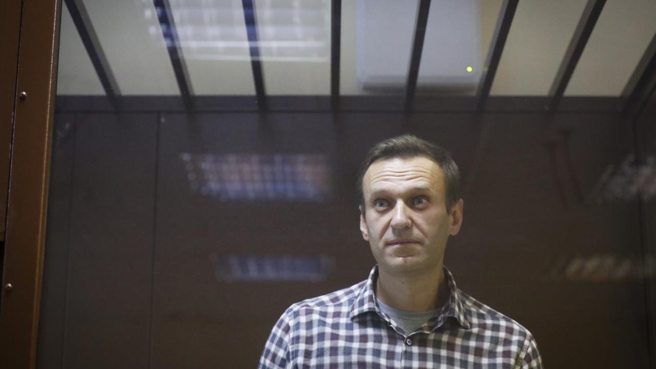 L'opposant russe Alexeï Navalny, photographié ici lors de son procès, le 20 février 2021 à Moscou. [AP/Keystone - Alexander Zemlianichenko]