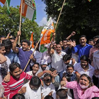 Des activistes manifestent après la mort de quatre paysans dans l'Uttar Pradesh, renversés par le convoi d'un ministre fédéral. [AP Photo/Keystone - Manish Swarup]