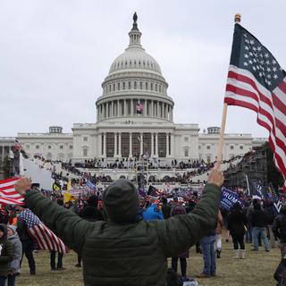 Manifestants pro-Trump face au Capitole, Washington DC, 6 janvier 2021. [KEYSTONE - MICHAEL REYNOLDS]