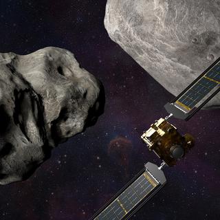 Une illustration de la NASA montrant le vaisseau DART s'approchant des astéroïdes Dimorphos et Didymos. [Keystone/epa - Steve Gribben/NASA/Johns Hopkins APL]