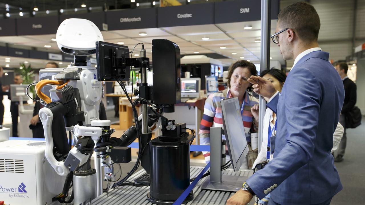 Des robots au grand salon international de la haute-précision à Genève. [Keystone - Salvatore Di Nolfi]