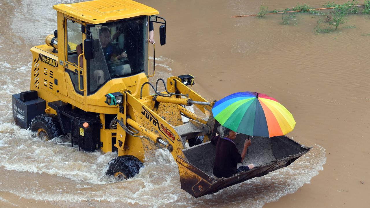 Evacuation d'une localité chinoise cernée par les eaux. [AFP - Li Jianan]