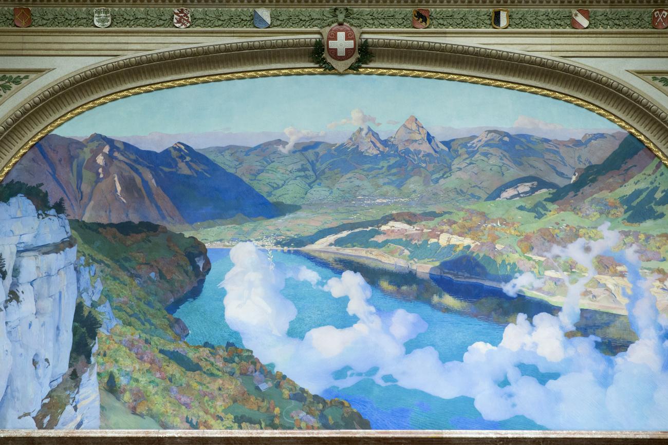La fresque dans la salle du Conseil national représentent, au premier plan, la prairie du Grütli, le berceau de la Confédération, et, à l'arrière-plan, le massif montagneux des Mythen. [KEYSTONE - PETER KLAUNZER]