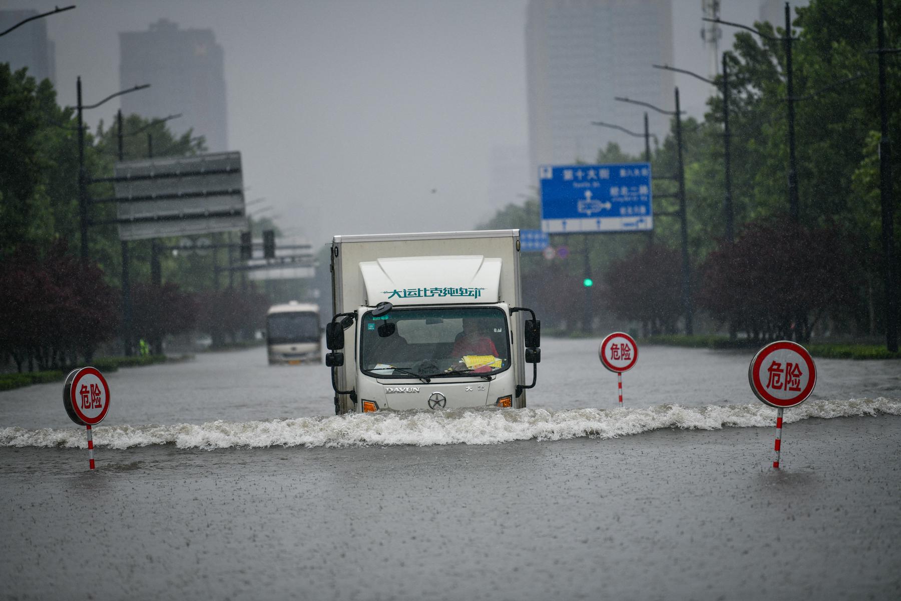 Selon les autorités chinoises, les pluies dans la région ont été les plus fortes jamais enregistrées depuis 60 ans. [IMAGINECHINA VIA AFP - HOU JIANXUN]