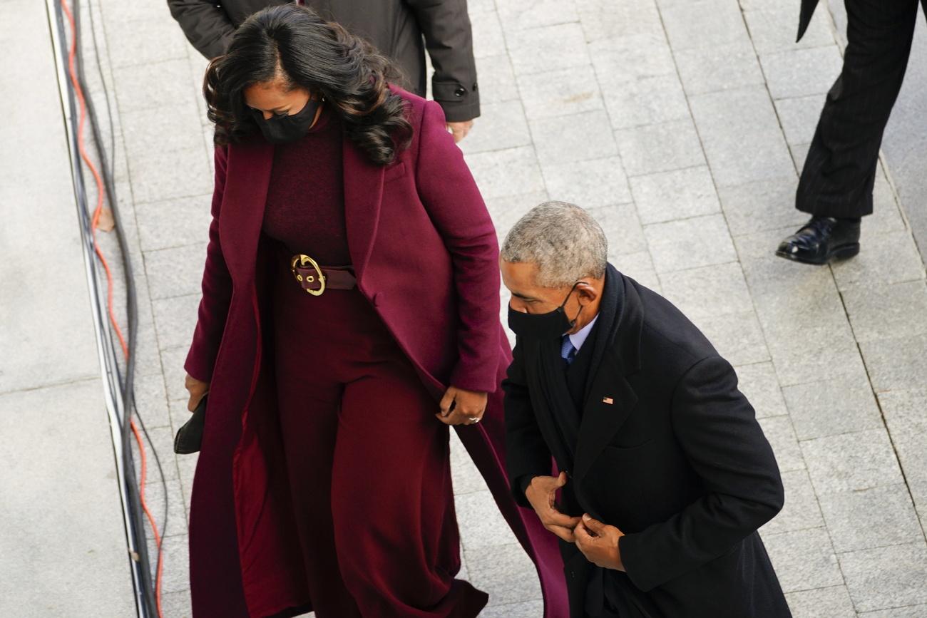 Michelle et Barack Obama arrivent au Capitole. [Keystone - EPA/Melina Mara]