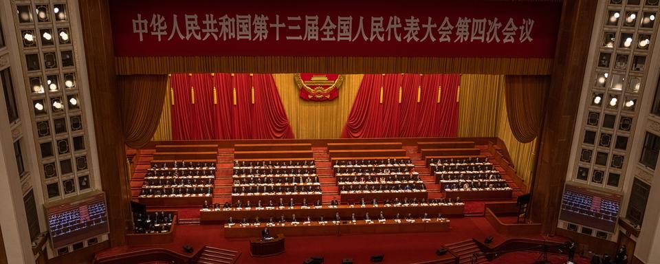 L'Assemblée nationale populaire chinoise réunie à Pékin le 5 mars 2021. [Keystone - EPA/ROMAN PILIPEY]