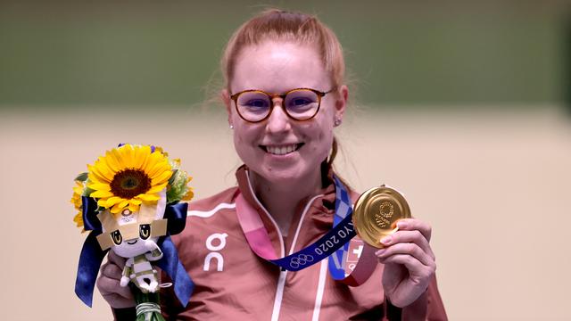 Nina Christen, tout à sa joie, remporte sa 2e médaille de ces Jeux, son 1er titre! [Reuters]
