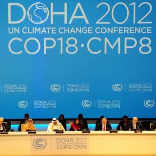 Un discours lors de la COP18 à Doha. [EPA/Keystone - STR]