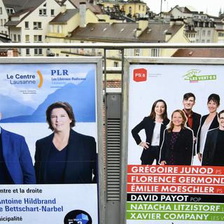 Des affiches de partis politiques à Lausanne en mars 2021. [Keystone - Laurent Gillieron]