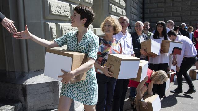 L'initiative dite "correctrice" avait été déposée à Berne le 24.06.2019. [Keystone - Peter Schneider]