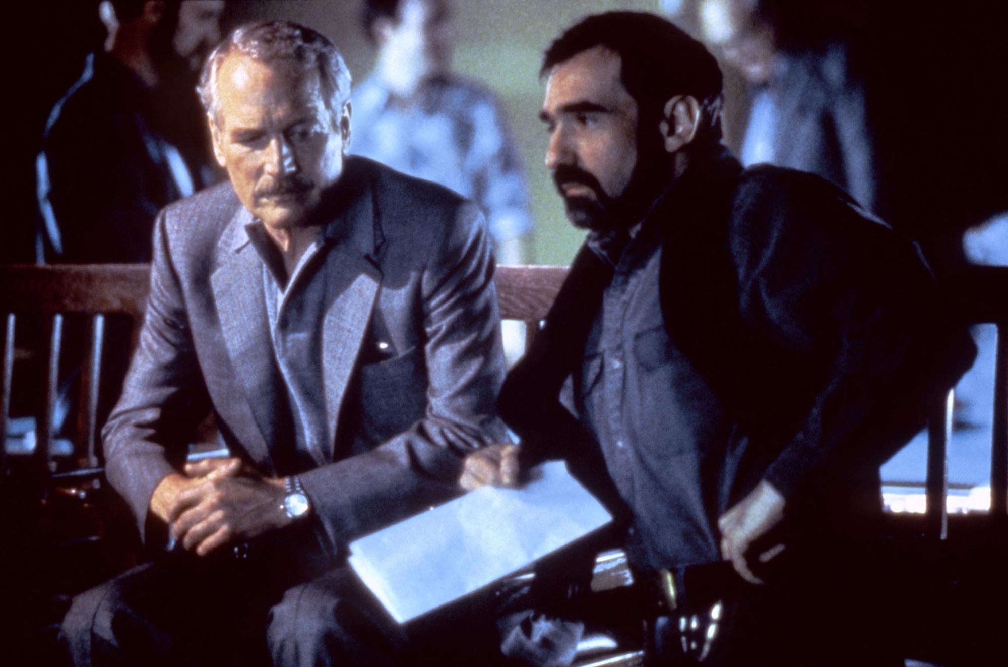 L'acteur Paul Newman (à gauche) et le réalisateur Martin Scorsese sur le tournage du film "La Couleur de l'argent". [Touchstone Pictures / Silver Scr / Collection ChristopheL via AFP]