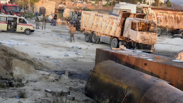 Les images du lieu du drame après l'explosion du camion-citerne. [Keystone]