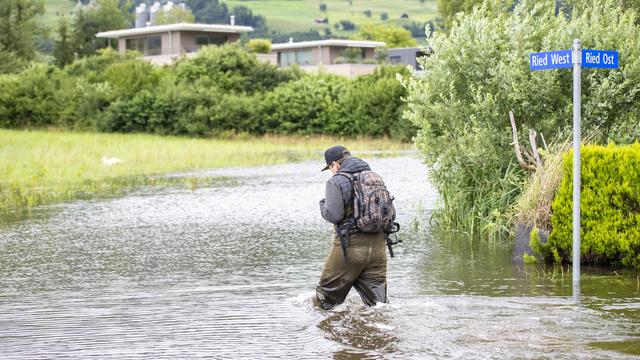 Un quartier inondé au bord du lac de Sarnen, dans le canton d'Obwald, le 15 juillet 2021. [Keystone - Urs Flueeler]