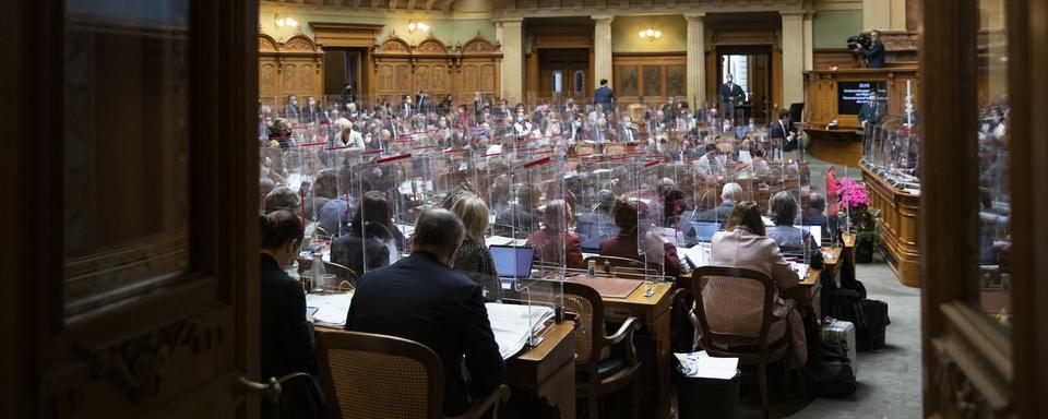 La salle du Conseil national pendant les débats lors de la session de printemps. [Keystone - Peter Klaunzer]