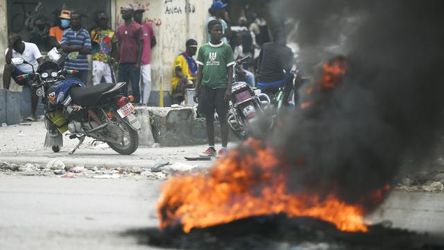 Haïti, en grande partie dominée par les gangs, est le théâtre de nombreux soulèvements de la population mécontente. [Keystone - Matias Delacroix]