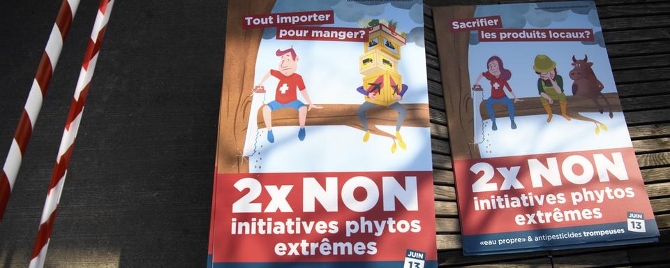 Le comité national contre les initiatives "Pour une eau potable propre" et "Pour une Suisse libre de pesticides de synthèse" a fustigé mardi à Berne "deux projets extrêmes". [Keystone - Laurent Gillieron]