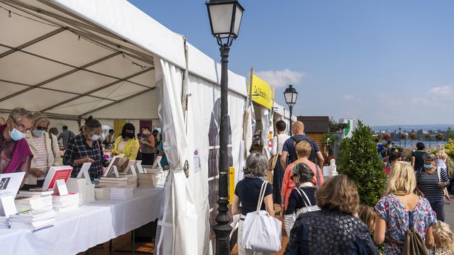 La 12e édition du Livre sur les Quais a attiré pas loin de 20'000 personnes malgré les restrictions sanitaires. [Keystone - Jean-Christophe Bott]