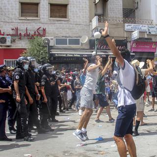Une manifestation à Tunis le 25 juillet 2021. [AP Photo/Keystone - Hassene Dridi]