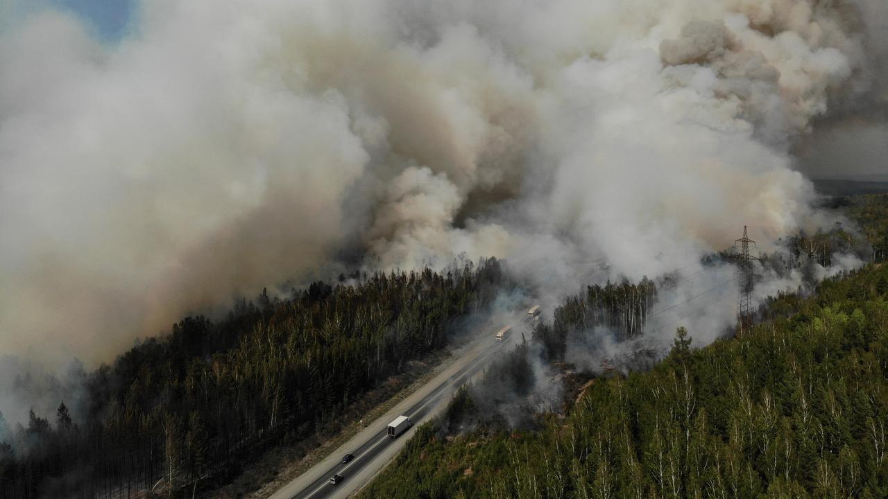 Des feux de forêt "extrêmes" sévissaient mercredi dans les régions du centre de la Russie, face à une vague de chaleur survenue après des incendies qui ont ravagé la Sibérie pendant une grande partie de l'été. [SPUTNIK VIA AFP - VLADIMIR KOTSYUBA-BELYH]