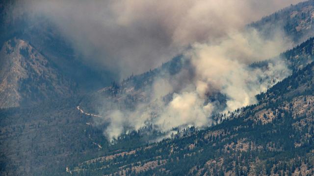 Des dizaines d'incendies font rage dans l'Ouest du Canada. [Keystone - Darryl Dyck]