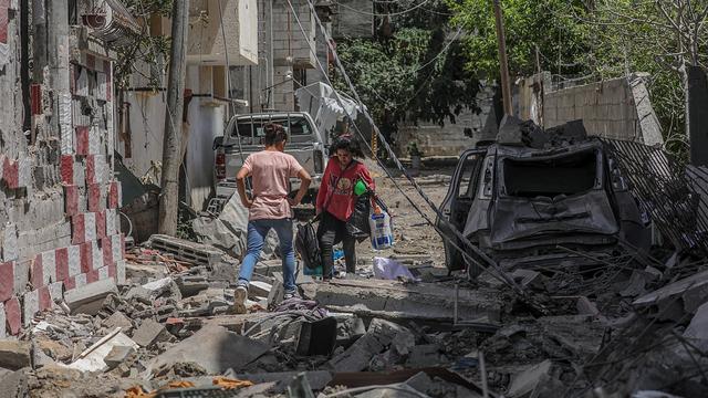 Après 11 jours de combats, de nombreux quartiers sont en ruine dans les villes de la bande de Gaza. [EPA/Keystone - Mohammed Saber]