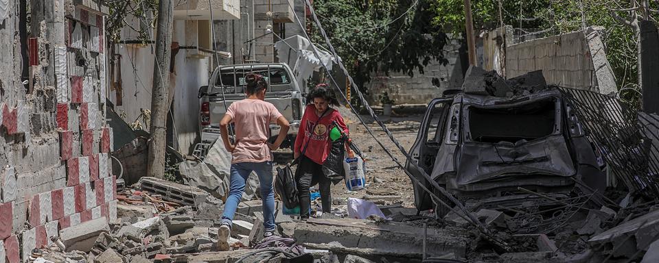 Après 11 jours de combats, de nombreux quartiers sont en ruine dans les villes de la bande de Gaza. [EPA/Keystone - Mohammed Saber]