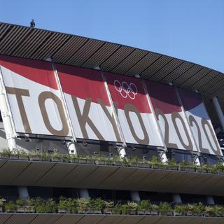 Quelque 11'000 sportifs olympiques et 4400 sportifs paralympiques vont concourir à Tokyo. [Keystone - Franck Robichon]