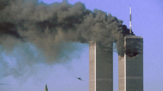 Les deux tours jumelles du World Trade Center à New-York juste avant l'impact du deuxième avion, le 11 septembre 2001. [Reuters]