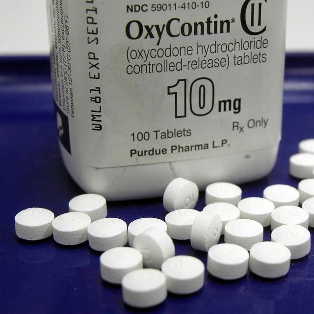 Près d'un demi-million d'Américains sont morts d'overdose causée à la fois par des opiacés prescrits ou vendus illégalement entre 1999 et 2018. [Keystone - Toby Talbot]