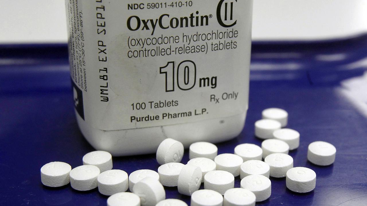 Près d'un demi-million d'Américains sont morts d'overdose causée à la fois par des opiacés prescrits ou vendus illégalement entre 1999 et 2018. [Keystone - Toby Talbot]