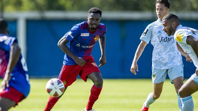 L'ancien junior de Moudon (au centre) n'a pas réussi à s'imposer avec le maillot du FC Bâle. [Keystone - Urs Flueeler]