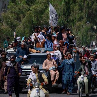 Des talibans célébrent le départ des Etats-Unis le 31 août 2021 [EPA/Keystone - Stringer]