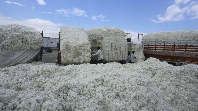 De nombreuses entreprises, notamment actives dans l’industrie du textile, travaillent dans la région du Xinjiang. [Keystone - Sanjeev Gupta]